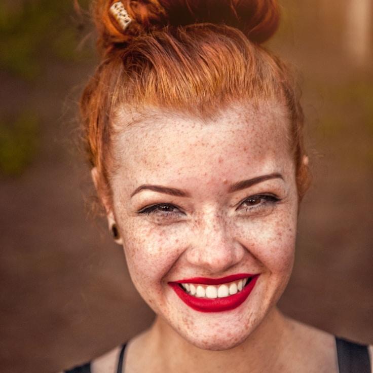 Kaveri Mehta, Lead Design Curator at VastPlanetCore, reviewing corporate floral arrangements